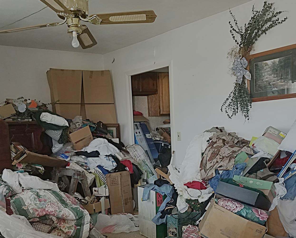 room filled with hoarders rubbish